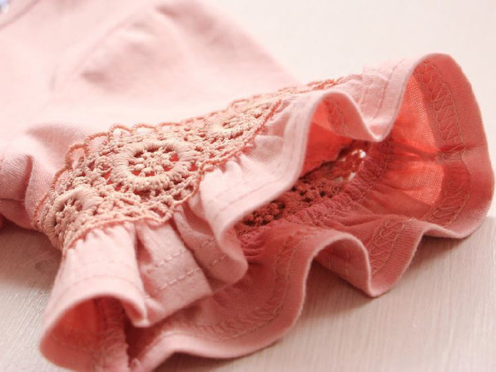 CAMISETA ROSADA TEJIDA EN LA MANGA